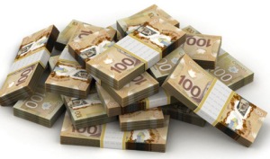 piles-de-billets-de-100-dollars-canadiens _manque à gagner non-reconnaissance des acquis